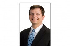 E. Travis Smith. Jr., M.D.