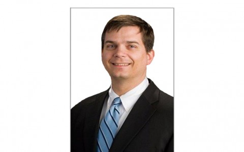 E. Travis Smith. Jr., M.D.